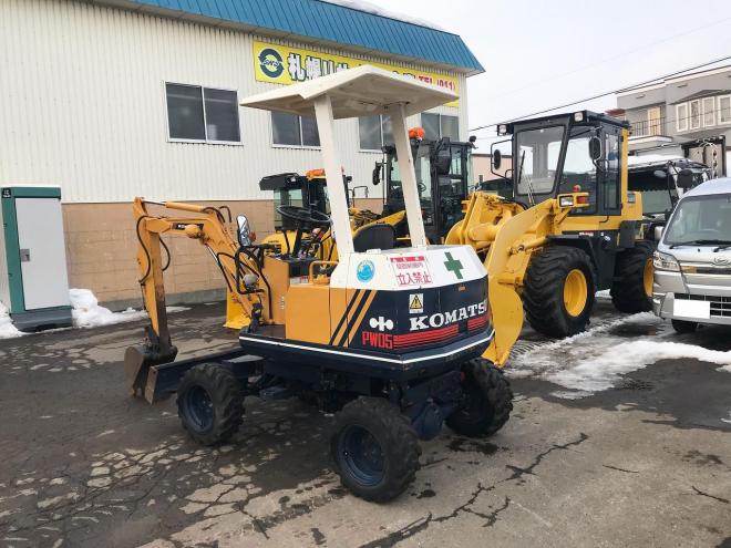 バックホーコマツ　中古　ホイール式ミニユンボ　PW05　油圧ショベル