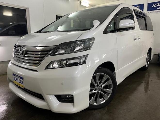 ヴェルファイア２．４Ｚ　プラチナセレクションⅡ　本州仕入　禁煙車　ＷＡＫＯＳバリアスコーティング済　純正１８インチＡＷ　純正１６ＡＷ＋スタッドレスタイヤ付　純正ＨＤＤナビ（ＣＤ＆ＤＶＤ再生　フルセグ地デジ　Ｂｌｕｅｔｏｏｔｈ）＋バックカメラ　フロントブラインドカメラ　両側パワースライドドア　パワーバックドア　ドライブレコーダー　クルーズコントロール　７人乗りキャプテンシート　オットマン　コーナーセンサー　横滑り防止装置　ＰＵＳＨスタート　スマートキー　タイミングチェーン車　ＨＩＤヘッドライト　ビルトインＥＴＣ 4WD 