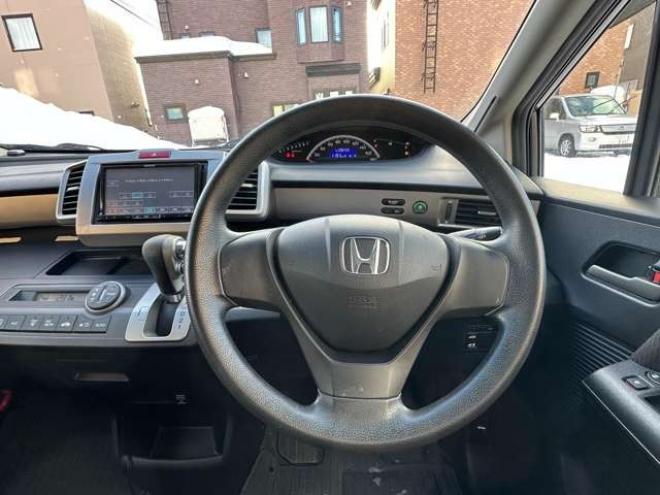 フリード1.5 G ジャストセレクション 4WD　片側パワースライドドア 1500