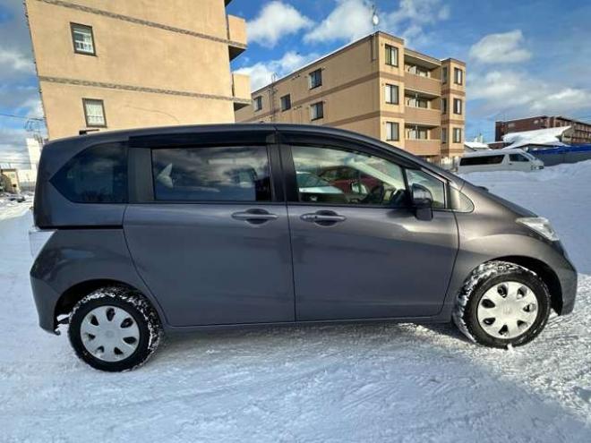フリード1.5 G ジャストセレクション 4WD　片側パワースライドドア 1500