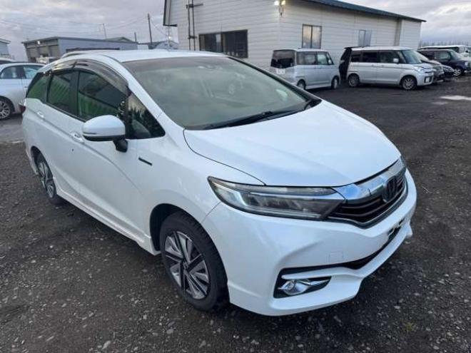シャトル1.5 ハイブリッド X ホンダセンシング 4WD　ナビ　TV　Bカメラ　Bluetooth　夏冬タイヤ 1500