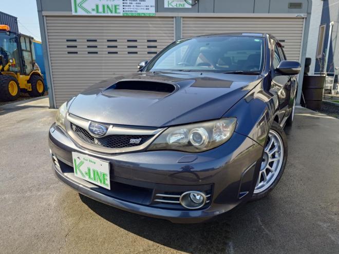 インプレッサWRX STI ワンオーナー　ローダウン　STIレカロシート　SI-DRIVE　ディーラーオプションストラーダナビ・TV　バックカメラ　ドアバイザー　夏タイヤ＆社外18インチAW　冬タイヤ＆STI純正18インチAW　スマートキー　スペアキー　 カタログ燃費　JC08モード9.4km/L　4WD 2000 5Dr