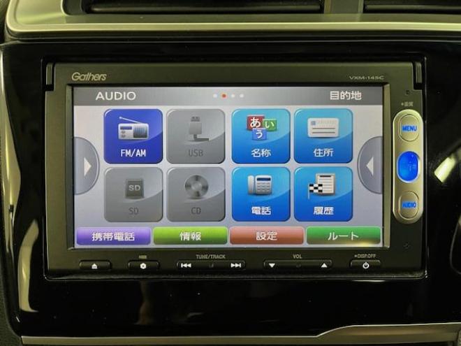 フィット１３Ｇ　Ｆパッケージ　本州仕入　禁煙車　ＷＡＫＯＳバリアスコーティング済　社外１５インチＡＷ　１５インチホイール＋スタッドレスタイヤ付　純正ギャザースナビ＋バックカメラ　ＰＵＳＨスタート　スマートキー　ミラーヒーター　フロントガラス熱線　アイドリングストップ　盗難防止装置　横滑り防止装置 4WD 1300 5Dr