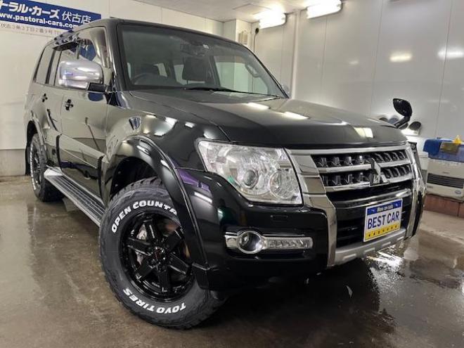 パジェロロング　エクシード　後期型　寒冷地仕様　禁煙車　ダブルバッテリー　ディーゼルターボ　新品ＷＥＤＳキーラー１７ＡＷ＋新品ＴＯＹＯホワイトレタータイヤ　社外１７ＡＷ＋スタッドレスタイヤ付　新品ＪＡＯＳブラックマッドガード　パナソニックナビ＋バックカメラ　クルーズコントロール　エンジンスターター　両席シートヒーター　リアヒーター　横滑り防止装置　盗難防止装置　１００Ｖ電源　ＨＩＤ 4WD 3200 5Dr