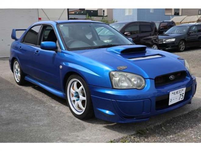 インプレッサSTI 2.0 WRX 4WD　6速マニュアル・ナビ・キーレス・社外マフラー・ローダウン・Tベル済み・R9/7月 2000