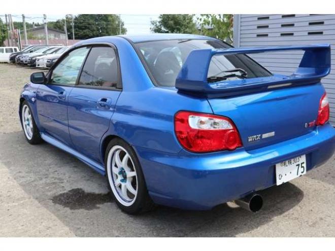 インプレッサSTI 2.0 WRX 4WD　6速マニュアル・ナビ・キーレス・社外マフラー・ローダウン・Tベル済み・R9/7月 2000