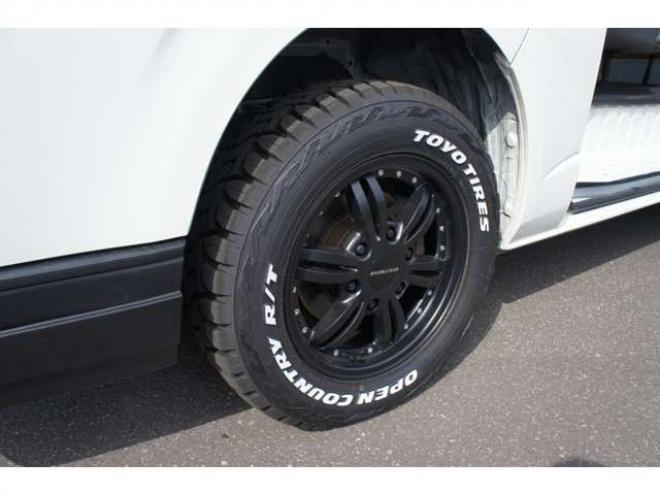 ハイエースバン2.8 DX ロング ディーゼルターボ 4WD　フロントシートセパレート仕様変更済　　　センターコンソール付　415COBRA丸目ライトキット&バッドラッカー16インチAW　415SAFARIフロントスポイラー　TOYOオープンカントリーR/T　電動格納ドアミラー 2800