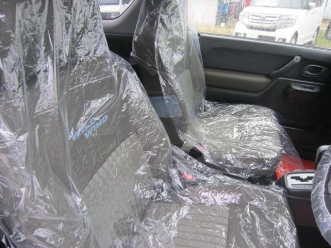 ジムニーワイルドウインド 4WD　社外アルミ ナビ&フルセグTV エンジンスターター シート&ミラーヒーター フォグ ドアバイザー ABS スタッドレス+アルミセット積込み 1年間走行無制限保証付 660