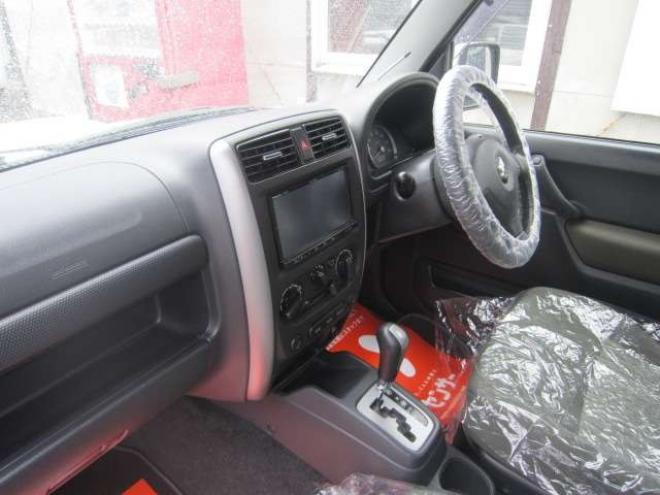 ジムニーワイルドウインド 4WD　社外アルミ ナビ&フルセグTV エンジンスターター シート&ミラーヒーター フォグ ドアバイザー ABS スタッドレス+アルミセット積込み 1年間走行無制限保証付 660