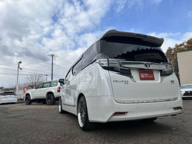 ヴェルファイアハイブリッド 2.5 V E-Four 4WD　社外アルミ　オートミラー　ETC　ドライブレコーダー　ローダウン　ワンオーナー　両側電動スライドドア　パワステ　パワーウィンドウ　ベージュ革シート　純正ナビ　バックカメラ　ABS　キーレスエントリー 2500