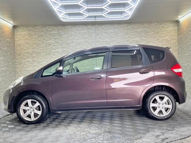 フィット1.3G 4WD 5年保証 バックカメラ 寒冷地仕様 禁煙 車検整備2年付 修復歴無