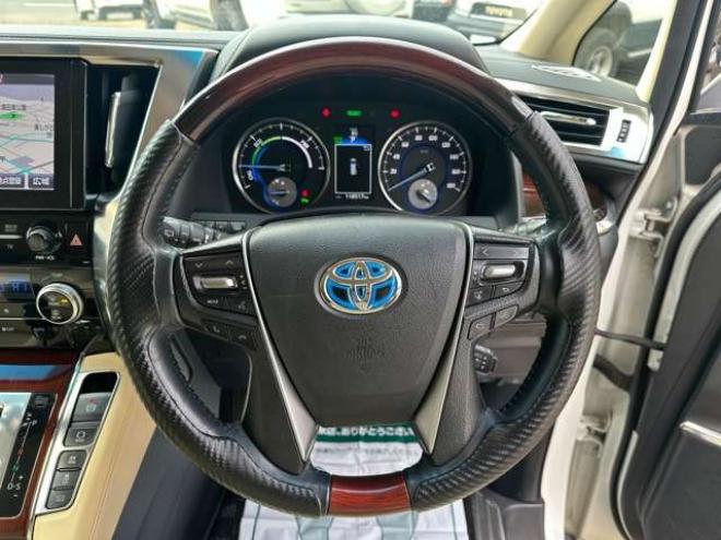 ヴェルファイアハイブリッド 2.5 V E-Four 4WD　社外アルミ　オートミラー　ETC　ドライブレコーダー　ローダウン　ワンオーナー　両側電動スライドドア　パワステ　パワーウィンドウ　ベージュ革シート　純正ナビ　バックカメラ　ABS　キーレスエントリー 2500