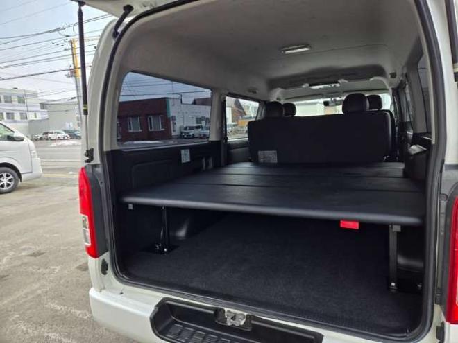 ハイエースバン2.7 スーパーGL ダークプライム ワイド ミドルルーフ ロングボディ 4WD　4WD　寒冷地仕様　両側パワスラ　スマキー　プッシュスタート　リアヒーター&クーラー　アルパインインナーミラー&フリップダウンモニター　社外メモリナビ　フルセグTV　ETC　ベッドキッド　Bカメラ 2700