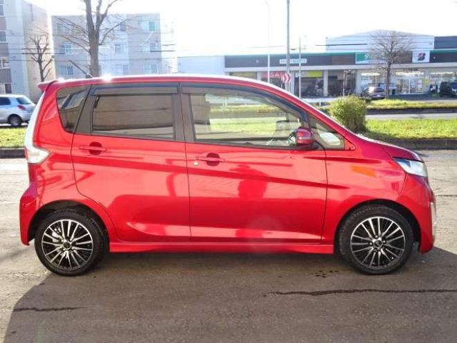 eKカスタムT セーフティパッケージ 4WD　保証1年/走行距離無制限　4WD　衝突軽減ブレーキシステム　純正ナビ　地デジ　バックカメラ　社外エンジンスターター　シートヒーター　社外15インチアルミ　純正HID　ウインカーミラー　横滑り防止　寒冷地仕様 660