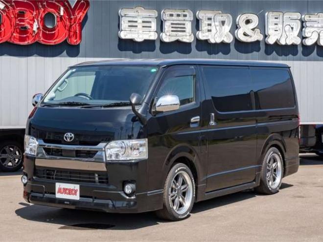 ハイエースバン2.8ダークプライム マルチロールトランスポータータイプIIロング ディーゼルターボ4WD　モデリスタフルエアロ・415COBRAバッドラッカー18インチAW・純正SDナビTV・Bカメラ・両側パワスラ・LEDライト・スマキー・AC100V・ベッドキット・エンスタ 2800
