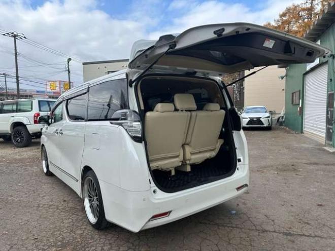 ヴェルファイアハイブリッド 2.5 V E-Four 4WD　社外アルミ　オートミラー　ETC　ドライブレコーダー　ローダウン　ワンオーナー　両側電動スライドドア　パワステ　パワーウィンドウ　ベージュ革シート　純正ナビ　バックカメラ　ABS　キーレスエントリー 2500