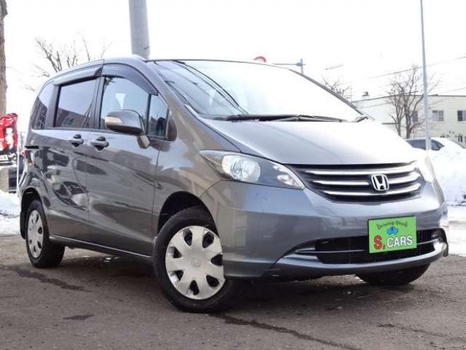 フリード1.5 G ジャストセレクション 4WD　本州車　4WD　パワースライドドア　純正HDDインターナビ　バックカメラ　TV　ビルトインETC　コンフォートパッケージ　HID　ミラーヒーター　デアイサー　車検新規2年 1500