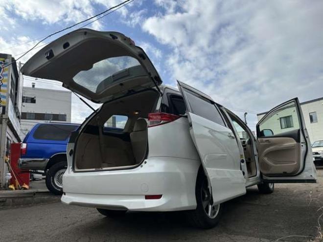 エスティマハイブリッド2.4 X 4WD　ETC　地デジ　クルーズコントロール　純正オーディオ　バックカメラ　両側スライドドア左側電動　3列シート　パワステ　パワーウィンドウ　純正アルミ　ABS　キーレスエントリー 2400