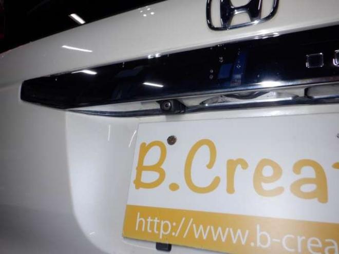 N-BOXG EX ホンダセンシング 4WD　本州仕入・ナビ・TV・B/T・Bカメラ・両側電動・LEDヘッドライト・1オーナー・スマートキー・プッシュスタート・シートヒーター・オートライト・衝突軽減・クルコン・ステアリングスイッチ・クリアランスソナー 660