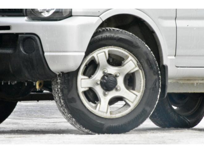ジムニーXG　４ＷＤ　本州仕入　５ＭＴ　ブリジストンスタッドレス　社外ナビ　ＥＴＣ