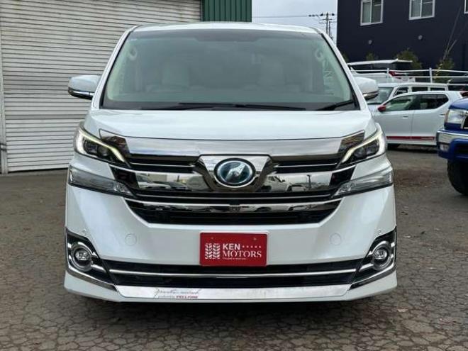 ヴェルファイアハイブリッド 2.5 V E-Four 4WD　社外アルミ　オートミラー　ETC　ドライブレコーダー　ローダウン　ワンオーナー　両側電動スライドドア　パワステ　パワーウィンドウ　ベージュ革シート　純正ナビ　バックカメラ　ABS　キーレスエントリー 2500