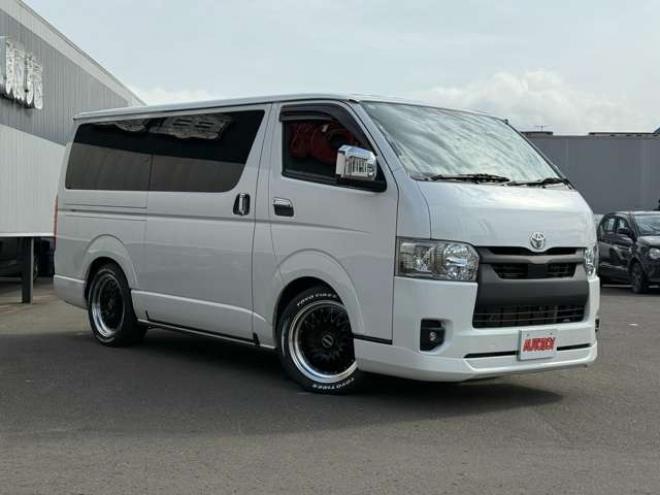 ハイエースバン2.8ダークプライムIIマルチロールトランスポータータイプIロングディーゼルターボ4WD　寒冷地仕様　ワンオーナー　ESSEX　ENCM18インチAW　ESSEXフロントリップスポイラー　ローダウン　パワースライドドア　LEDテール　415COBRAシートカバー&ローフォルムフェンダー&ステアリング 2800