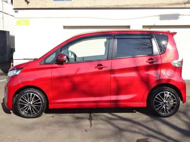 eKカスタムT セーフティパッケージ 4WD　保証1年/走行距離無制限　4WD　衝突軽減ブレーキシステム　純正ナビ　地デジ　バックカメラ　社外エンジンスターター　シートヒーター　社外15インチアルミ　純正HID　ウインカーミラー　横滑り防止　寒冷地仕様 660