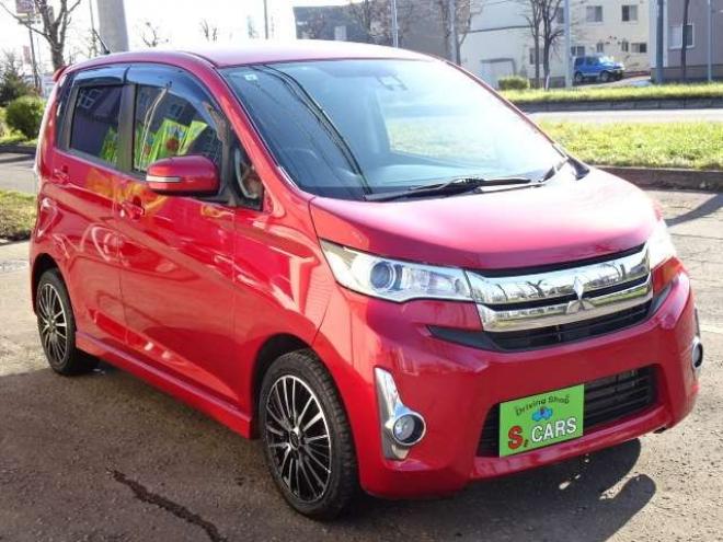 eKカスタムT セーフティパッケージ 4WD　保証1年/走行距離無制限　4WD　衝突軽減ブレーキシステム　純正ナビ　地デジ　バックカメラ　社外エンジンスターター　シートヒーター　社外15インチアルミ　純正HID　ウインカーミラー　横滑り防止　寒冷地仕様 660