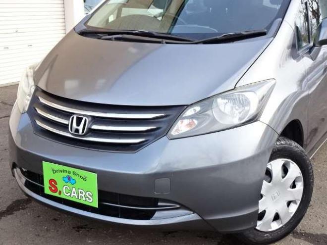 フリード1.5 G ジャストセレクション 4WD　本州車　4WD　パワースライドドア　純正HDDインターナビ　バックカメラ　TV　ビルトインETC　コンフォートパッケージ　HID　ミラーヒーター　デアイサー　車検新規2年 1500