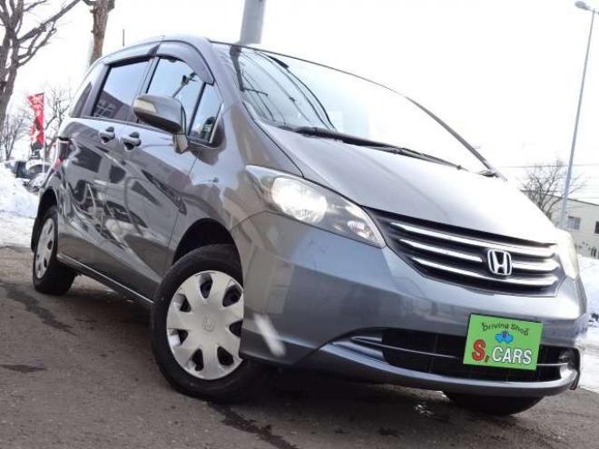 フリード1.5 G ジャストセレクション 4WD　本州車　4WD　パワースライドドア　純正HDDインターナビ　バックカメラ　TV　ビルトインETC　コンフォートパッケージ　HID　ミラーヒーター　デアイサー　車検新規2年 1500