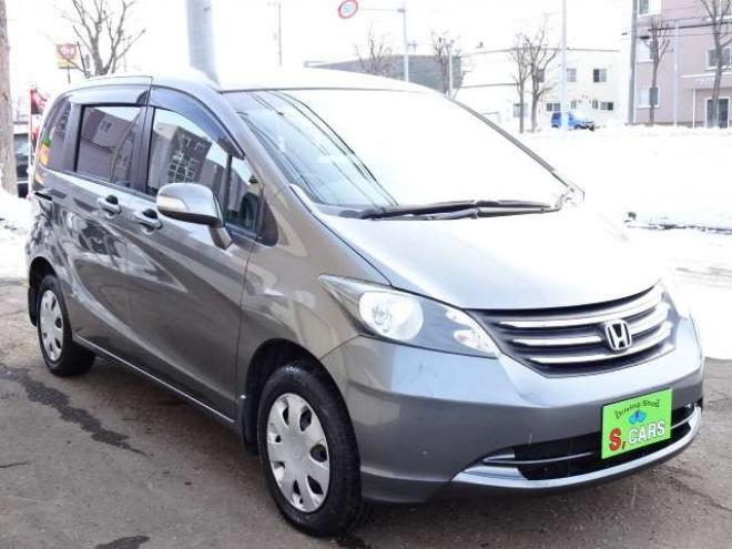 フリード1.5 G ジャストセレクション 4WD　本州車　4WD　パワースライドドア　純正HDDインターナビ　バックカメラ　TV　ビルトインETC　コンフォートパッケージ　HID　ミラーヒーター　デアイサー　車検新規2年 1500