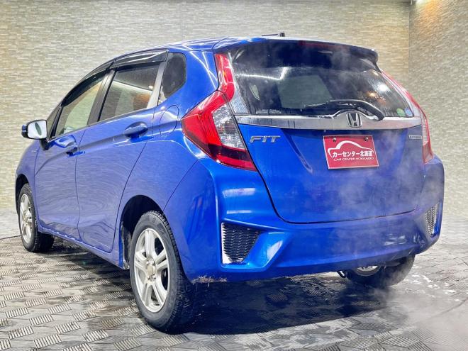フィット1.5ハイブリッドLパッケージ 4WD 5年保証 スマキー ナビTV Bカメ 夏冬タイヤ ETC 寒冷地仕様 禁煙 車検整備2年付 修復歴無