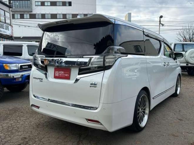 ヴェルファイアハイブリッド 2.5 V E-Four 4WD　社外アルミ　オートミラー　ETC　ドライブレコーダー　ローダウン　ワンオーナー　両側電動スライドドア　パワステ　パワーウィンドウ　ベージュ革シート　純正ナビ　バックカメラ　ABS　キーレスエントリー 2500