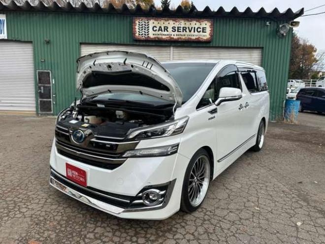 ヴェルファイアハイブリッド 2.5 V E-Four 4WD　社外アルミ　オートミラー　ETC　ドライブレコーダー　ローダウン　ワンオーナー　両側電動スライドドア　パワステ　パワーウィンドウ　ベージュ革シート　純正ナビ　バックカメラ　ABS　キーレスエントリー 2500