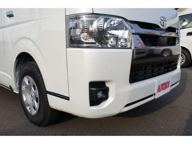 ハイエースバン2.8 スーパーGL ダークプライム S ロングボディ ディーゼルターボ 4WD　ダークプライムS　登録済未使用車　4WD　両側パワースライドドア　デジタルインナーミラー　全方位カメラ　バックカメラ　寒冷地仕様　プッシュスタート　スマートキー　415COBRAフラットベッドキット 登録済未使用車 2800