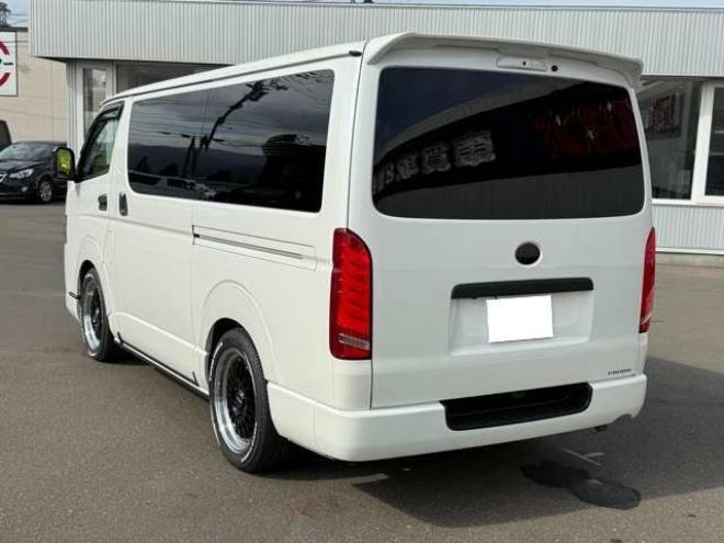 ハイエースバン2.8ダークプライムIIマルチロールトランスポータータイプIロングディーゼルターボ4WD　寒冷地仕様　ワンオーナー　ESSEX　ENCM18インチAW　ESSEXフロントリップスポイラー　ローダウン　パワースライドドア　LEDテール　415COBRAシートカバー&ローフォルムフェンダー&ステアリング 2800
