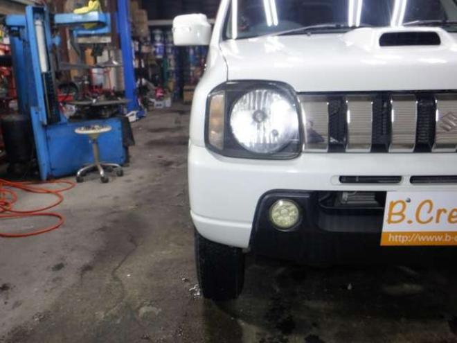 ジムニーワイルドウインド 4WD　本州仕入・ナビ・TV・Bカメラ・専用レザーシート・ETC・キーレス・シートヒーター・フォグランプ・ターボ・純正AW・電動格納ミラー・ミラーヒーター・ルーフレール 660