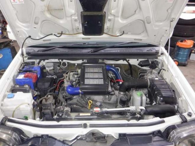 ジムニーワイルドウインド 4WD　本州仕入・ナビ・TV・Bカメラ・専用レザーシート・ETC・キーレス・シートヒーター・フォグランプ・ターボ・純正AW・電動格納ミラー・ミラーヒーター・ルーフレール 660