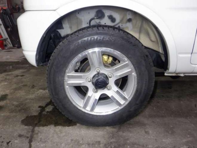 ジムニーワイルドウインド 4WD　本州仕入・ナビ・TV・Bカメラ・専用レザーシート・ETC・キーレス・シートヒーター・フォグランプ・ターボ・純正AW・電動格納ミラー・ミラーヒーター・ルーフレール 660