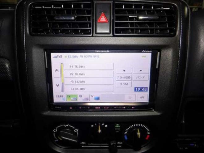 ジムニーワイルドウインド 4WD　本州仕入・ナビ・TV・Bカメラ・専用レザーシート・ETC・キーレス・シートヒーター・フォグランプ・ターボ・純正AW・電動格納ミラー・ミラーヒーター・ルーフレール 660