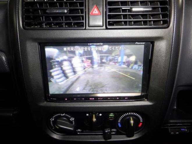 ジムニーワイルドウインド 4WD　本州仕入・ナビ・TV・Bカメラ・専用レザーシート・ETC・キーレス・シートヒーター・フォグランプ・ターボ・純正AW・電動格納ミラー・ミラーヒーター・ルーフレール 660