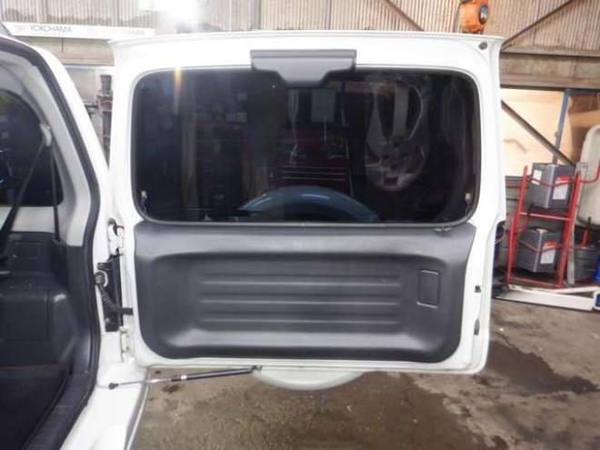 ジムニーワイルドウインド 4WD　本州仕入・ナビ・TV・Bカメラ・専用レザーシート・ETC・キーレス・シートヒーター・フォグランプ・ターボ・純正AW・電動格納ミラー・ミラーヒーター・ルーフレール 660