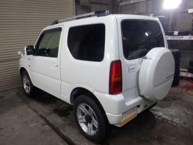 ジムニーワイルドウインド 4WD　本州仕入・ナビ・TV・Bカメラ・専用レザーシート・ETC・キーレス・シートヒーター・フォグランプ・ターボ・純正AW・電動格納ミラー・ミラーヒーター・ルーフレール 660