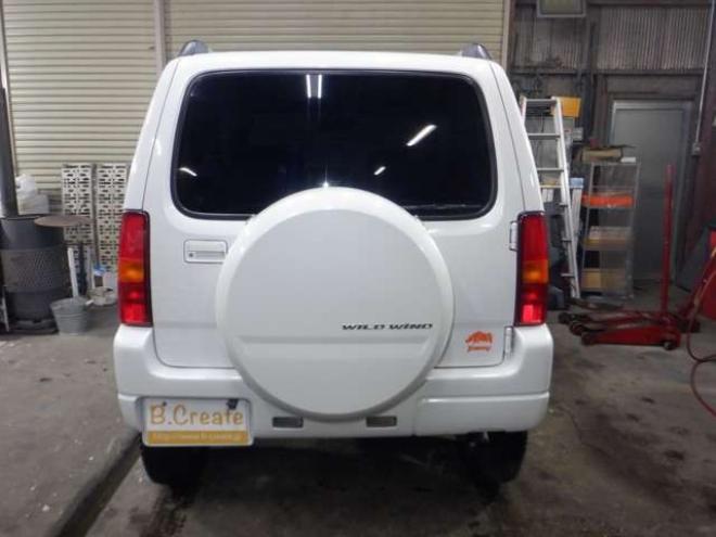 ジムニーワイルドウインド 4WD　本州仕入・ナビ・TV・Bカメラ・専用レザーシート・ETC・キーレス・シートヒーター・フォグランプ・ターボ・純正AW・電動格納ミラー・ミラーヒーター・ルーフレール 660