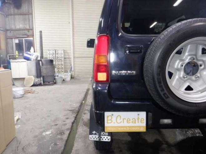 ジムニーワイルドウインド 4WD　本州仕入・ナビ・フルセグTV・キーレス・フォグランプ・シートヒーター・ミラーヒーター・ルーフレール・ターボ・社外AW・ライトレベライザー・電動格納ミラー・DVD再生・JAOSマッドガード 660