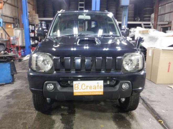 ジムニーワイルドウインド 4WD　本州仕入・ナビ・フルセグTV・キーレス・フォグランプ・シートヒーター・ミラーヒーター・ルーフレール・ターボ・社外AW・ライトレベライザー・電動格納ミラー・DVD再生・JAOSマッドガード 660