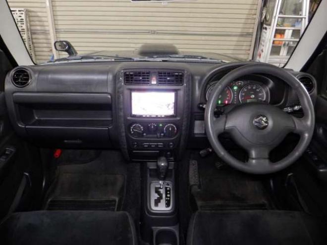 ジムニーワイルドウインド 4WD　本州仕入・ナビ・フルセグTV・キーレス・フォグランプ・シートヒーター・ミラーヒーター・ルーフレール・ターボ・社外AW・ライトレベライザー・電動格納ミラー・DVD再生・JAOSマッドガード 660