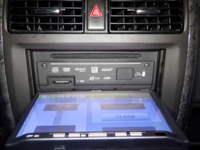 ジムニーワイルドウインド 4WD　本州仕入・ナビ・フルセグTV・キーレス・フォグランプ・シートヒーター・ミラーヒーター・ルーフレール・ターボ・社外AW・ライトレベライザー・電動格納ミラー・DVD再生・JAOSマッドガード 660