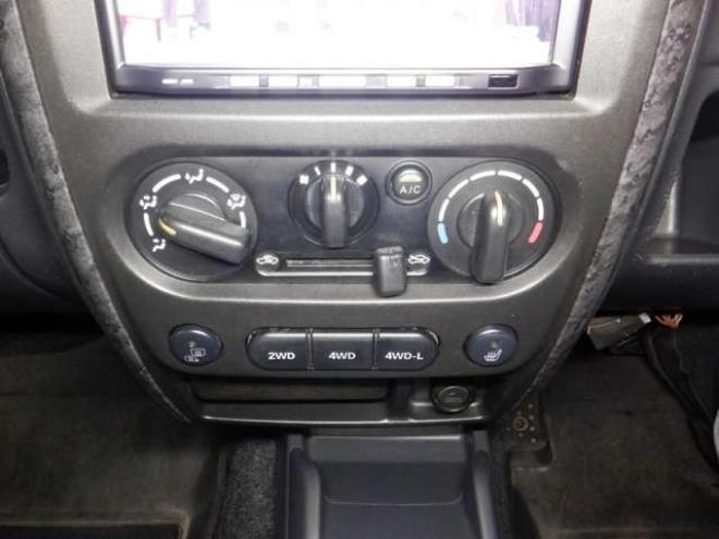 ジムニーワイルドウインド 4WD　本州仕入・ナビ・フルセグTV・キーレス・フォグランプ・シートヒーター・ミラーヒーター・ルーフレール・ターボ・社外AW・ライトレベライザー・電動格納ミラー・DVD再生・JAOSマッドガード 660