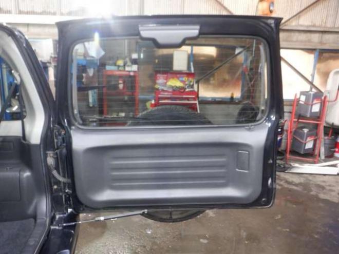 ジムニーワイルドウインド 4WD　本州仕入・ナビ・フルセグTV・キーレス・フォグランプ・シートヒーター・ミラーヒーター・ルーフレール・ターボ・社外AW・ライトレベライザー・電動格納ミラー・DVD再生・JAOSマッドガード 660